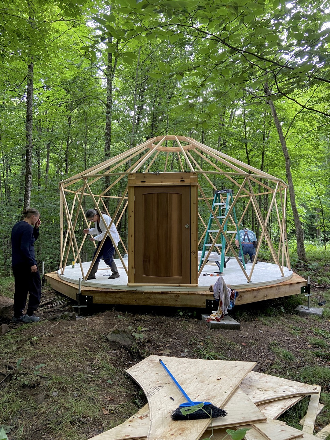 Bolting in the frame and securing the cedar door